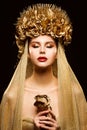 Woman in Gold Flower Crown, Fashion Model Beauty Makeup, Bride in Golden Veil holding Rose