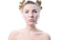 Woman with a gold laurel wreath.