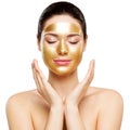 Woman Gold Mask, Beautiful Model with Golden Skin Cosmetic, Beauty Skincare and Treatment Royalty Free Stock Photo