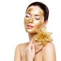 Woman Gold Mask, Facial Skin Beauty Cosmetic, Beautiful Girl Luxury Spa and Relax Royalty Free Stock Photo