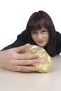 Woman with a gold nugget Royalty Free Stock Photo