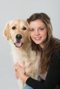 Woman with golden retriever dog on white background Royalty Free Stock Photo