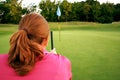 Woman on golf course Royalty Free Stock Photo
