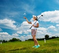 Woman on a golf field Royalty Free Stock Photo