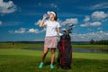 Woman on a golf field Royalty Free Stock Photo