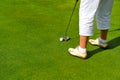 Woman golf player at the green, Andalusia, Spain Royalty Free Stock Photo