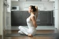 Woman in Gomukasana pose Royalty Free Stock Photo