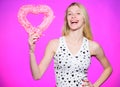 Woman gorgeous blonde girl hold heart valentines decoration. Happy valentines day. Valentines day attribute. Prepare