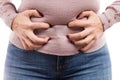 Woman grabbing her belly as painful abdominal problem Royalty Free Stock Photo