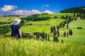 Woman in the grain field enjoying the view, Tuscany, Italy Royalty Free Stock Photo