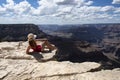 Woman in Grand Canyon National Park. USA traveling. World national landmark. Royalty Free Stock Photo