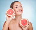 Woman, grapefruit and facial skincare wellness for natural beauty, salon spa care and luxury organic treatment in blue