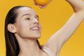 woman grapefruit in hands posing clean skin isolated background