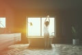 Woman in gray bathroom interior Royalty Free Stock Photo