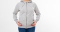 Woman in gray sweatshirt, hoodies. white background - Gray pullover hoodie mockup Royalty Free Stock Photo