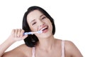 Woman with great teeth holding tooth-brush Royalty Free Stock Photo