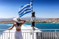 Woman on a Greek ferry boat traveling through the cyclades Royalty Free Stock Photo