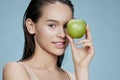 woman green apple near face health isolated background Royalty Free Stock Photo