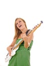 Woman in green dress playing electric guitar Royalty Free Stock Photo