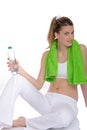 Woman with green fitness towel