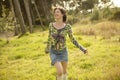 Woman in green outdoor running Royalty Free Stock Photo