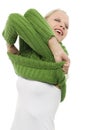 Woman with green turtleneck undressing