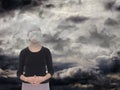 Woman with grey clouds. Depression,sadness concept.