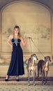 Woman with greyhounds Royalty Free Stock Photo