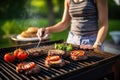 woman grilling portobello on open barbeque