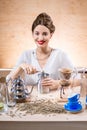 Woman grinding coffee