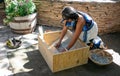 Woman Grinding Corn at Hopi Festival of Arts and Culture