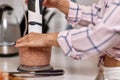 woman grinding meat. Preparation of minced meat.