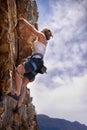 Woman, grip and rock climbing for fitness in outdoors, challenge and rope for training. Female person, cliff and extreme Royalty Free Stock Photo