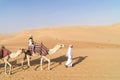 Woman on guided camel