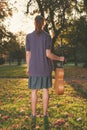 Woman with guitar at sunset in the park Royalty Free Stock Photo