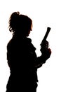 Woman with gun up silhouette Royalty Free Stock Photo