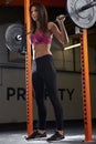 Woman In Gym Lifting Weights On Barbell Royalty Free Stock Photo