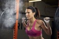 Woman In Gym Lifting Weights On Barbell Royalty Free Stock Photo