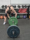 Woman in the gym prepared to train weight exercises Royalty Free Stock Photo