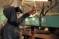 Woman hacking database in vr glasses, making hand gesture