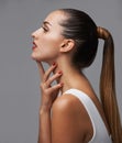 Woman, hair and beauty with profile in studio, cosmetics and manicure for glamour on grey background. Color nails, red