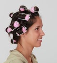 Woman with hair curlers Royalty Free Stock Photo