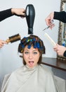 Woman with hair rollers Royalty Free Stock Photo