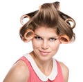 Woman in hair rollers Royalty Free Stock Photo