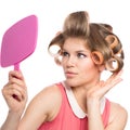 Woman in hair rollers Royalty Free Stock Photo