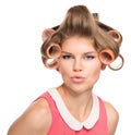 Woman in hair rollers