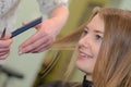 Woman haircut at salon