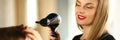 Woman Hairdresser Drying Male Hair with Hairdryer Royalty Free Stock Photo