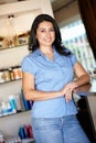 Woman hairdresser standing in salon