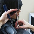 Woman in hairdressing salon